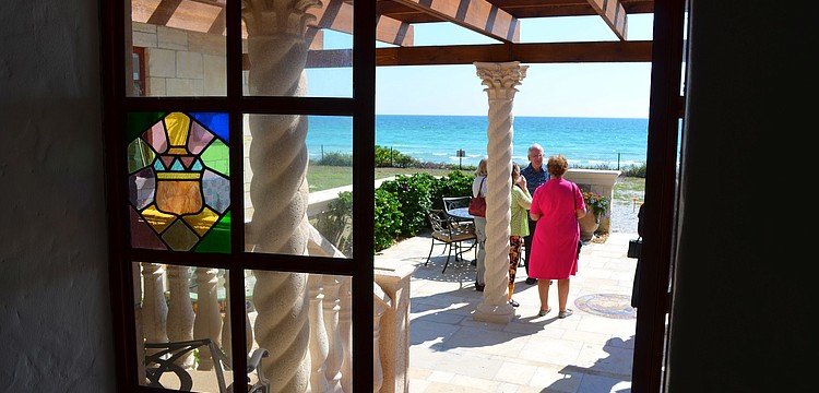 The home is complementary mix of new and old with expansive views of the water.