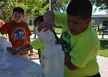 Melqui Batancourt competes in the Water Relay.