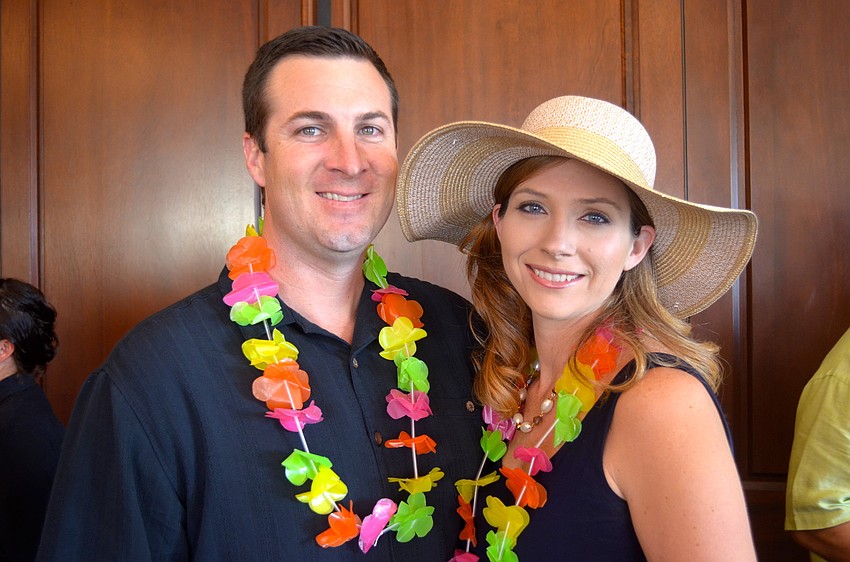 Mark and Crystal Rothhaar dress for the cruise-themed event.