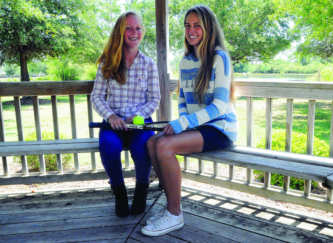 Out-of-Door Academy tennis players Mary Ann Rompf and Maria Ross will play together on the junior tennis circuit this summer. They hope to defend their state titles in the spring. Photo by Jen Blanco