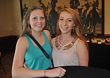Julie Smith, a Lakewood Ranch High School student, and Kayla Marfizo volunteered at the event.