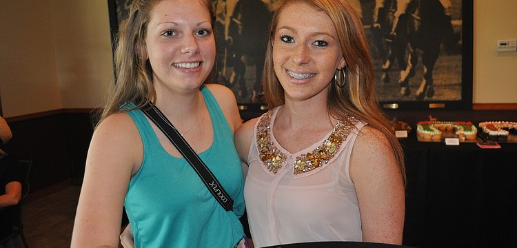 Julie Smith, a Lakewood Ranch High School student, and Kayla Marfizo volunteered at the event.