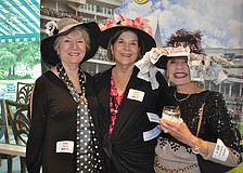 Judy Sturm, Abra Dennis and Janice Bushman showcase their derby spirit.