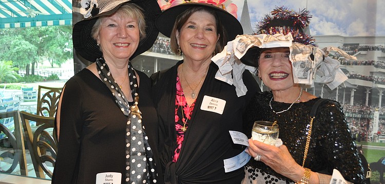 Judy Sturm, Abra Dennis and Janice Bushman showcase their derby spirit.