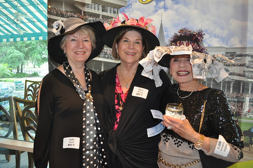 Judy Sturm, Abra Dennis and Janice Bushman showcase their derby spirit.