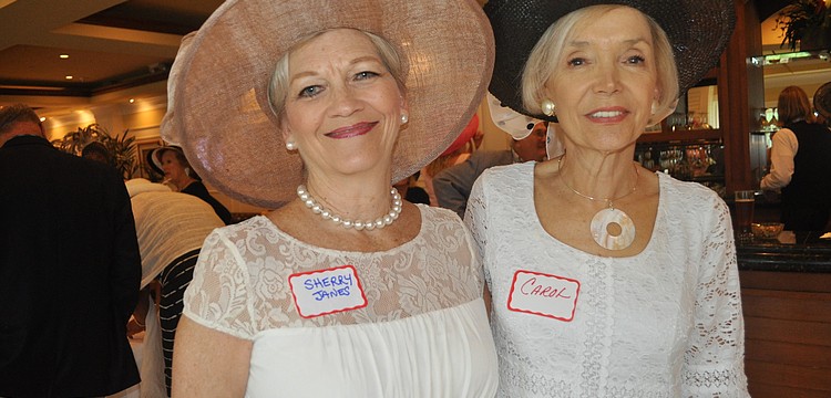 Sherry Janes, chairwoman of the Sarasota Singles Society, with Carol Erickson, who helped start the group