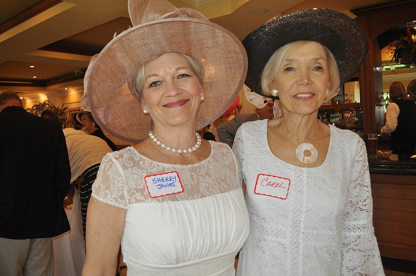 Sherry Janes, chairwoman of the Sarasota Singles Society, with Carol Erickson, who helped start the group