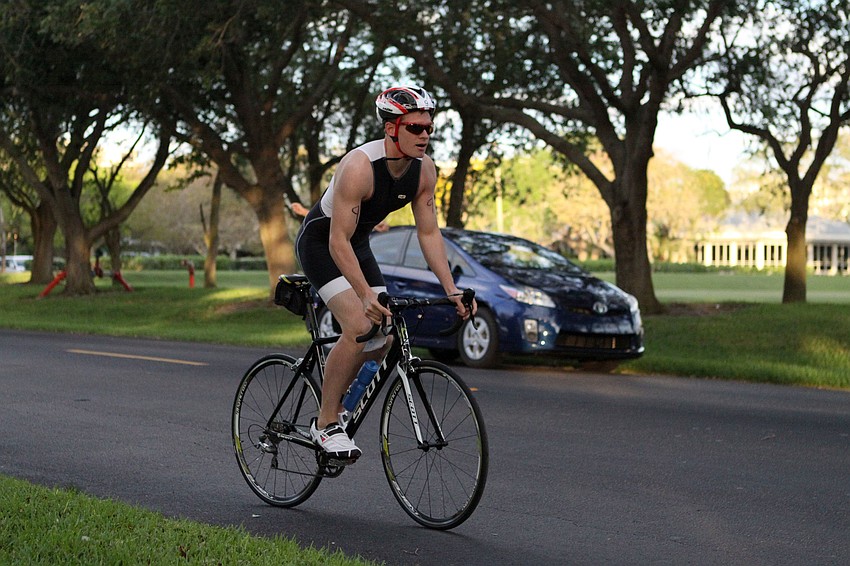 Brooks Bailey, No. 9, starts off on his bike.