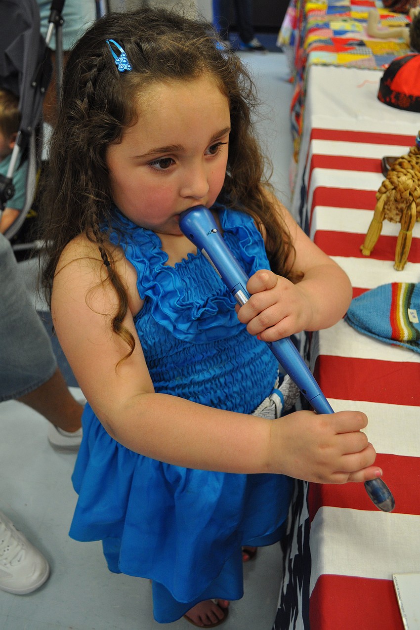 Natalia Santiago, 4, checked out items in the art room.