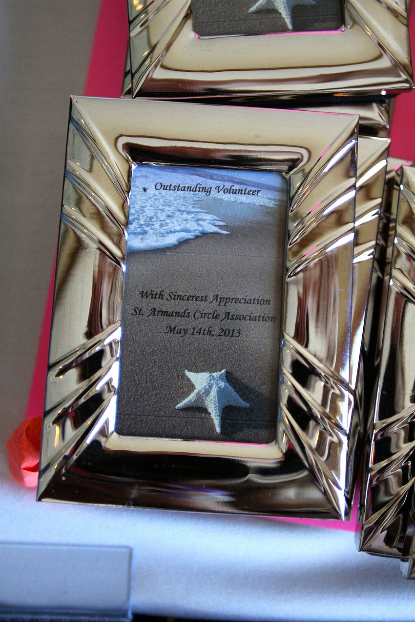 Every volunteer was given a little silver frame with a beach theme that said â€œOutstanding Volunteerâ€.