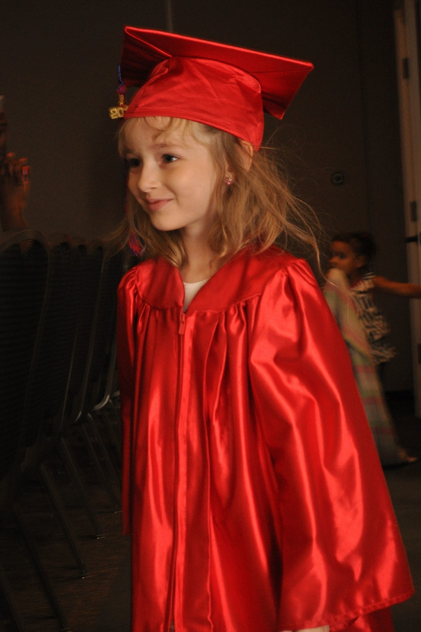 Veronica Densmore kept an eye out for her parents as she walked into the room.