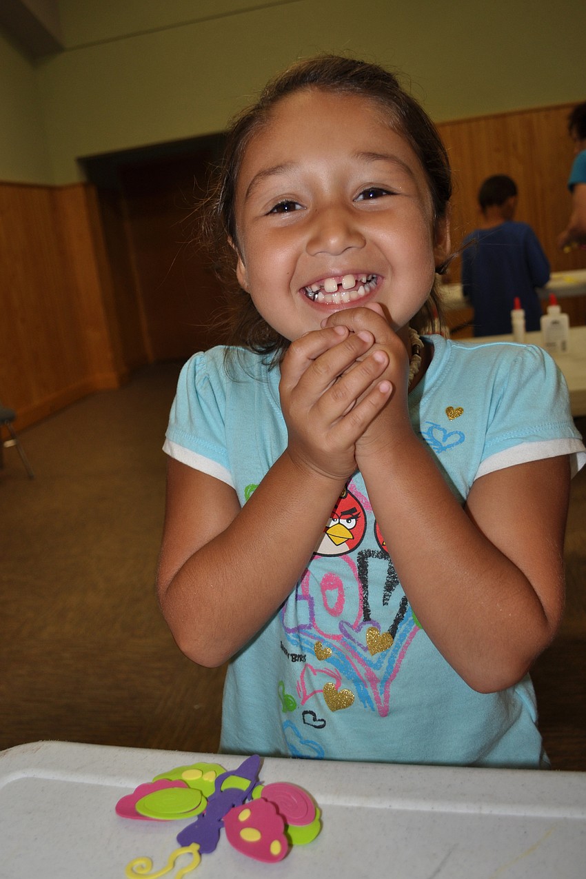 Nazaria Moore, 6, is excited about her butterfly craft.
