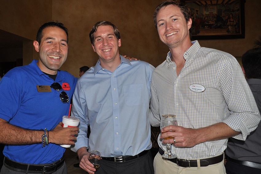 Arturo Santos Jr., of Young Professionals Group, with Sean Duade, of Sarasota Young Professionals, and Shane Green, of Keller Williams