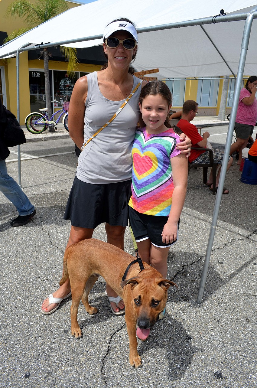 Lisa Temple with her daughter, Maxine and their dog, Sid.