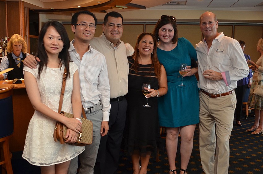 Joyce and Vincent Wong, Rick and Jennifer Travino and Holly and Mayson Brooks