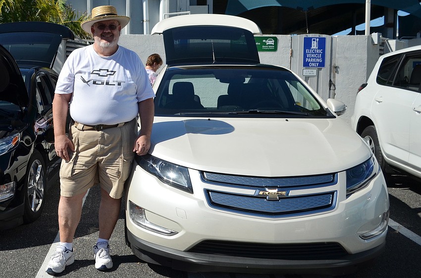 Edward Ellyatt with his electric Chevy Volt.