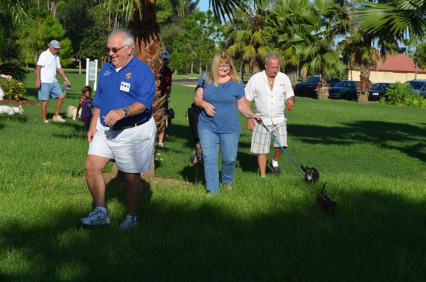 Lawrence Kocen leads the animal procession.