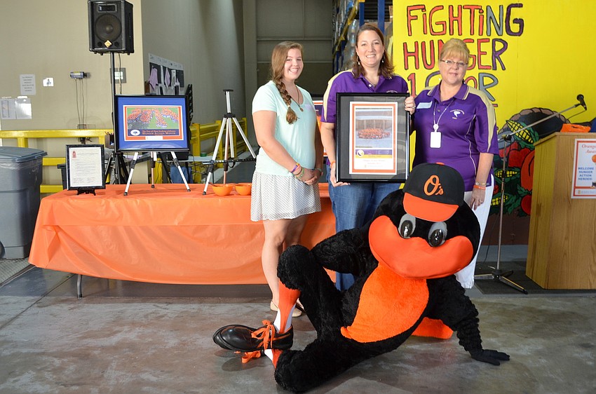 Cindy Allen, Michelle Anderson and Tricia Allen from Booker High School with Oriole, The Bird