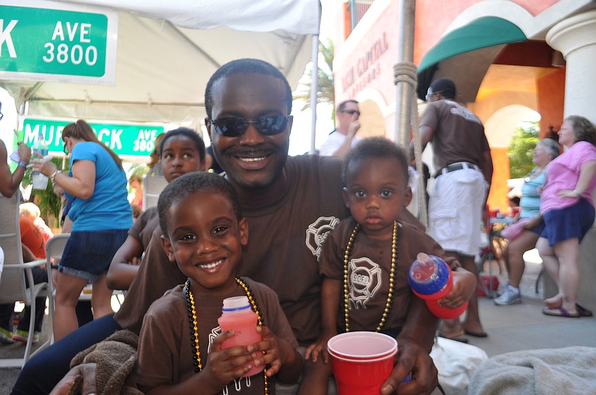 Rod Gobourne with sons Junior and Christian. Sarasota Station 7 made their chili with chocolate