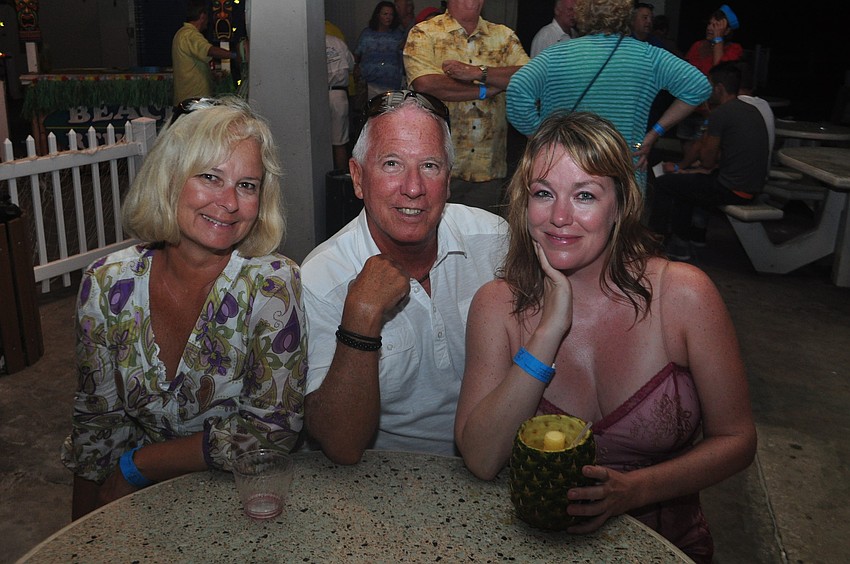 Lisa and Denny Petersen and Courtney Kees.