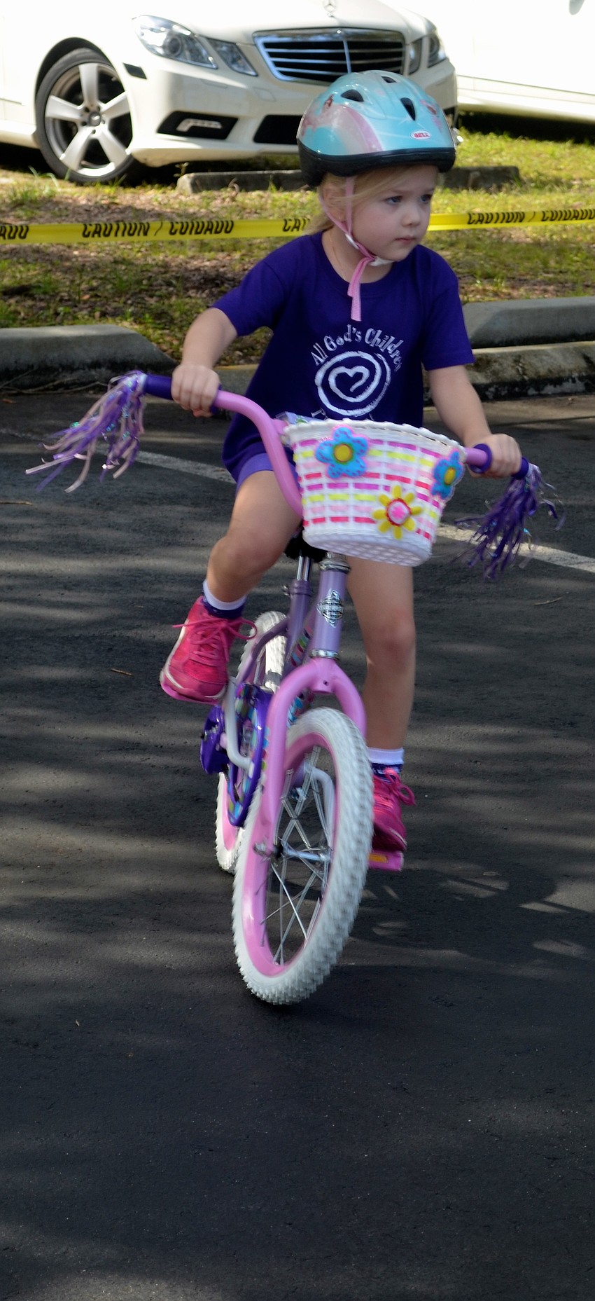 Four-year-old Addy Hartley shows off with no training wheels.