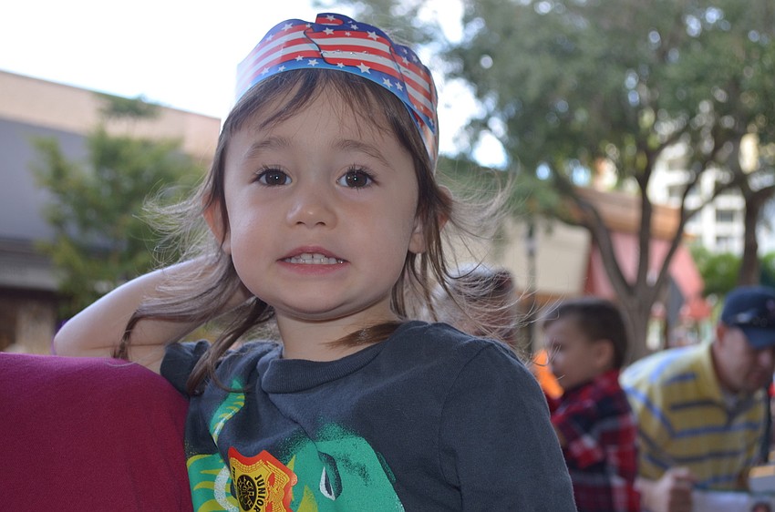 Camille Sheid wore a paper crown to the parade