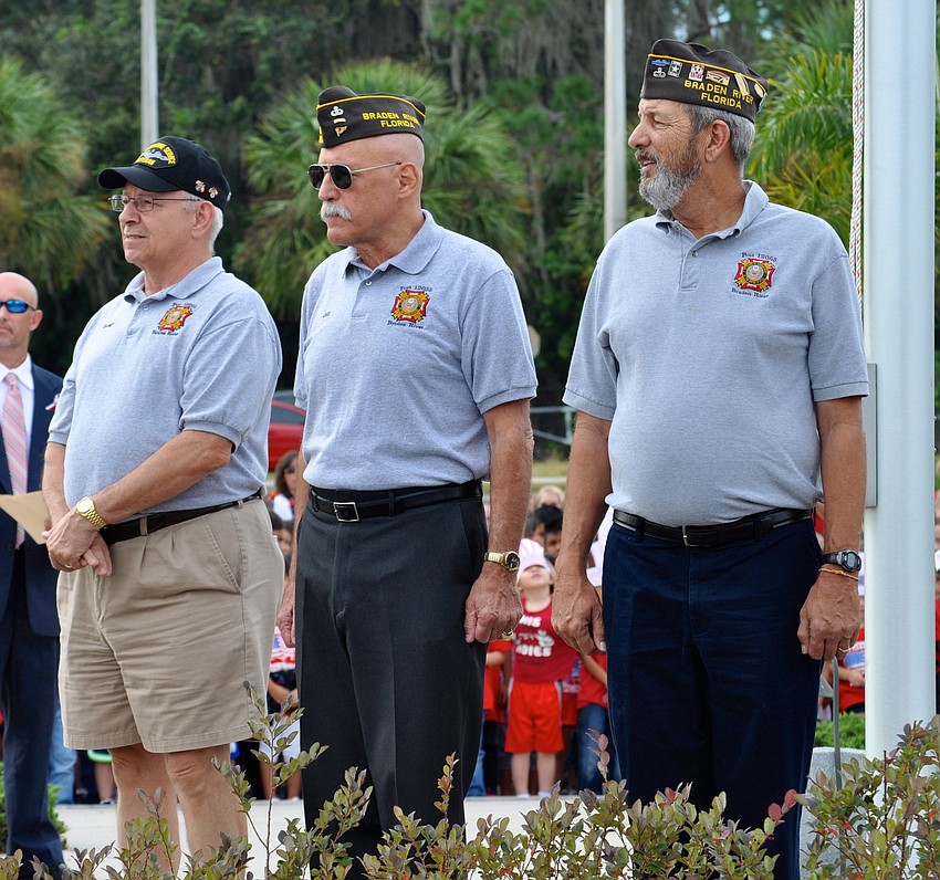 Veterans prepare for the flag raising ceremony.