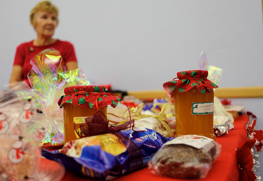 Mango jam is a crowd favorite from the homemade treat table, worked by Donna Leuchter.