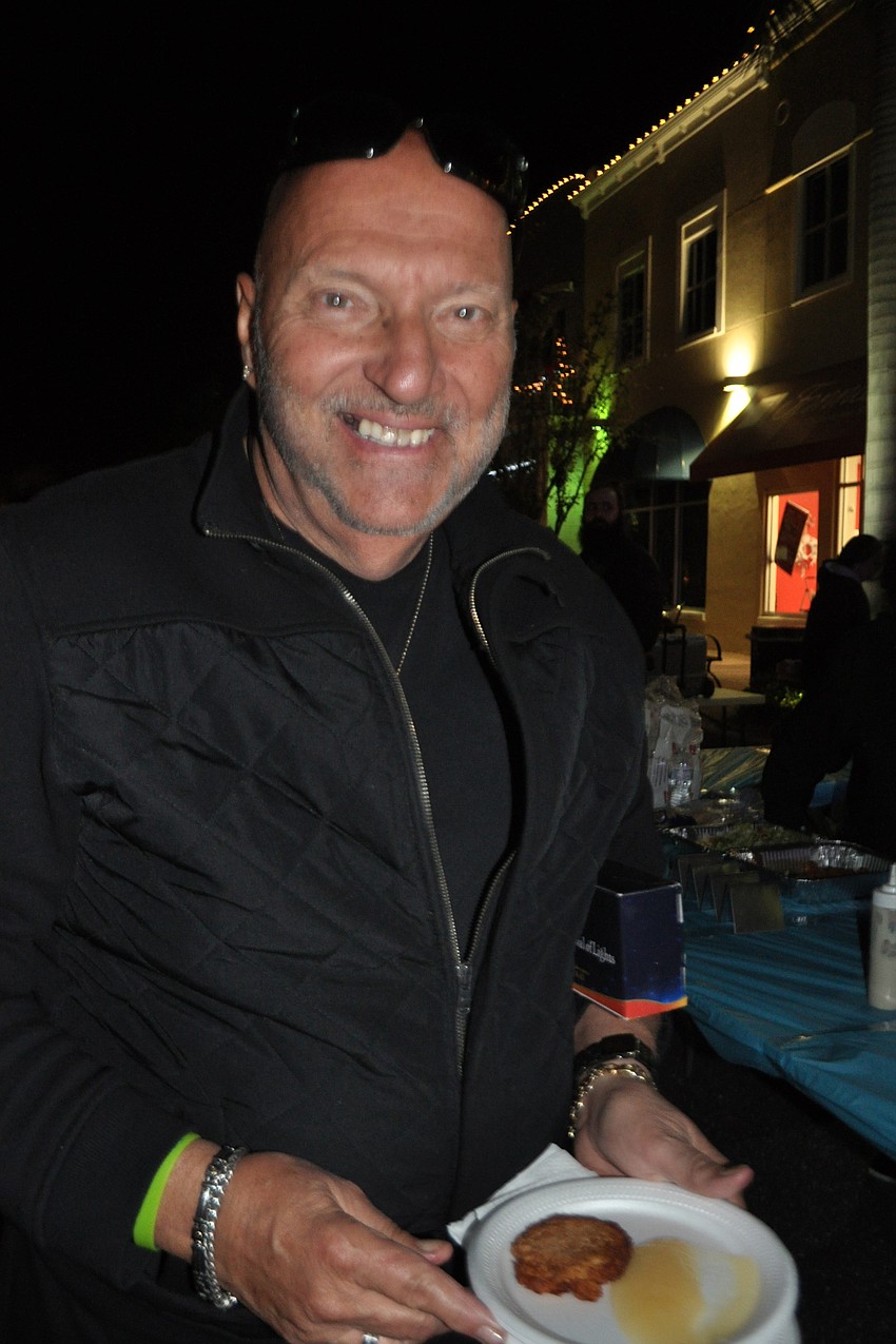 Jack Gootkin enjoys a falafel.