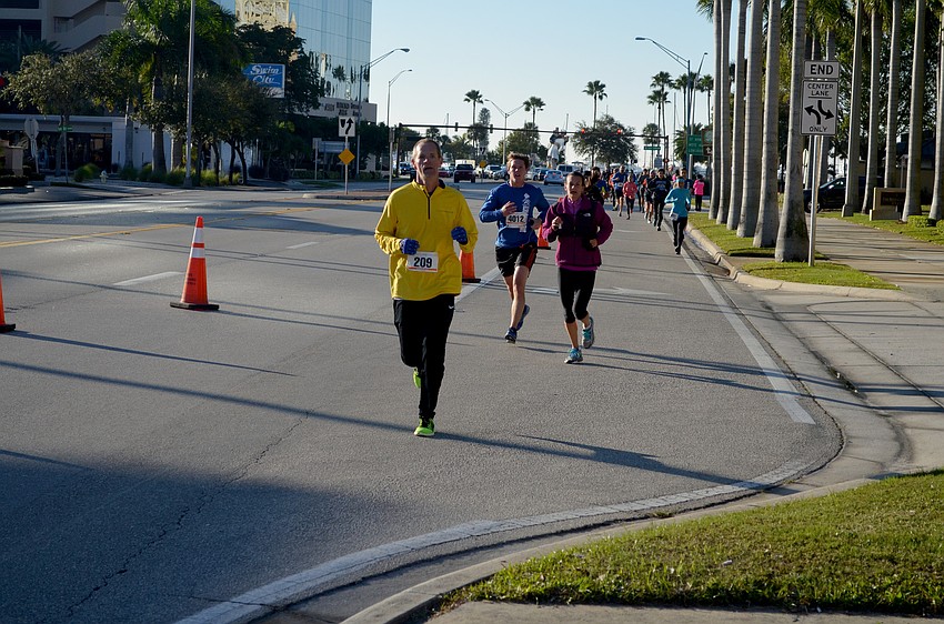 Runners pound the pavement for the Turkey Trot 5K.