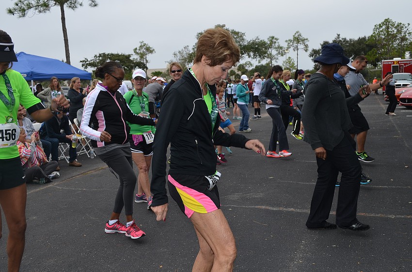 Boteena Pfeffer dances after the marathon.