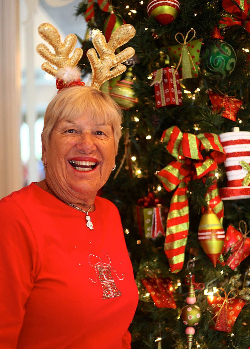 Nancy Chanos admires the Christmas decorations at the Harbourside Clubhouse.