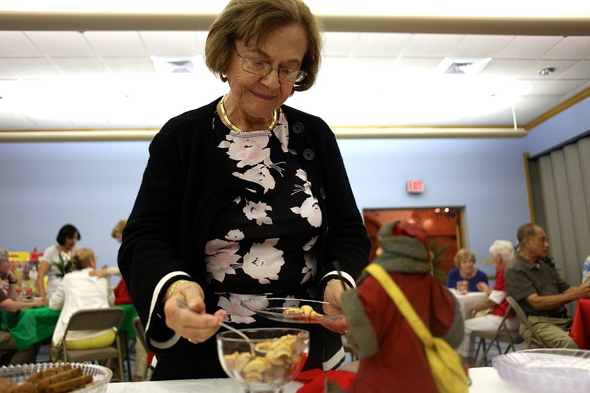 Rosella Quattrone visits the refreshments table.