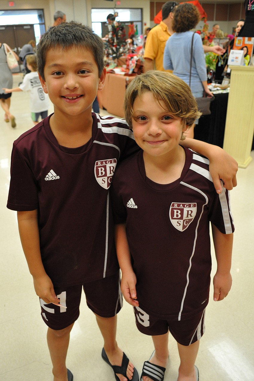 Brandon Jung and Ramsey Choueiri come to the event, after winning a soccer game.