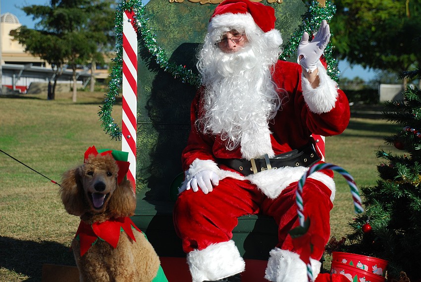 Sprakles sits with Santa