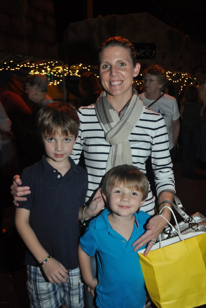 Tyler, Kristina and Mason Moreland enjoy the evening.