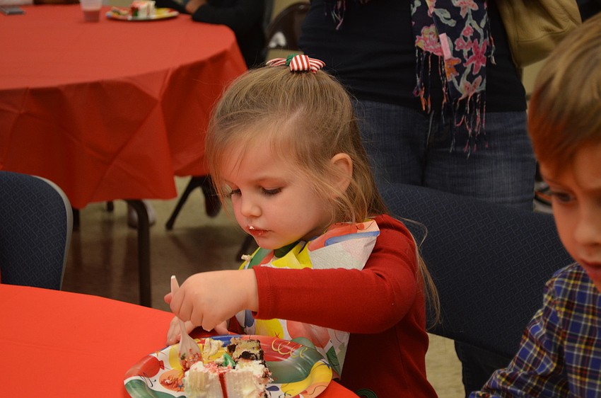 Olivia Gambert enjoys birthday cake after the pageant