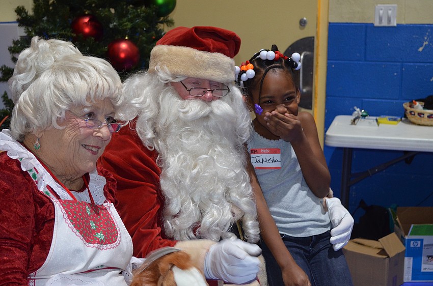 Jamesha Johnson had the giggles when she met Santa.