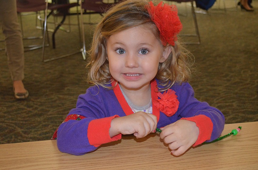 Laiken Slaydon works on her beading.
