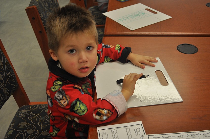 Austin Chavez, a pre-k student, played a word game.