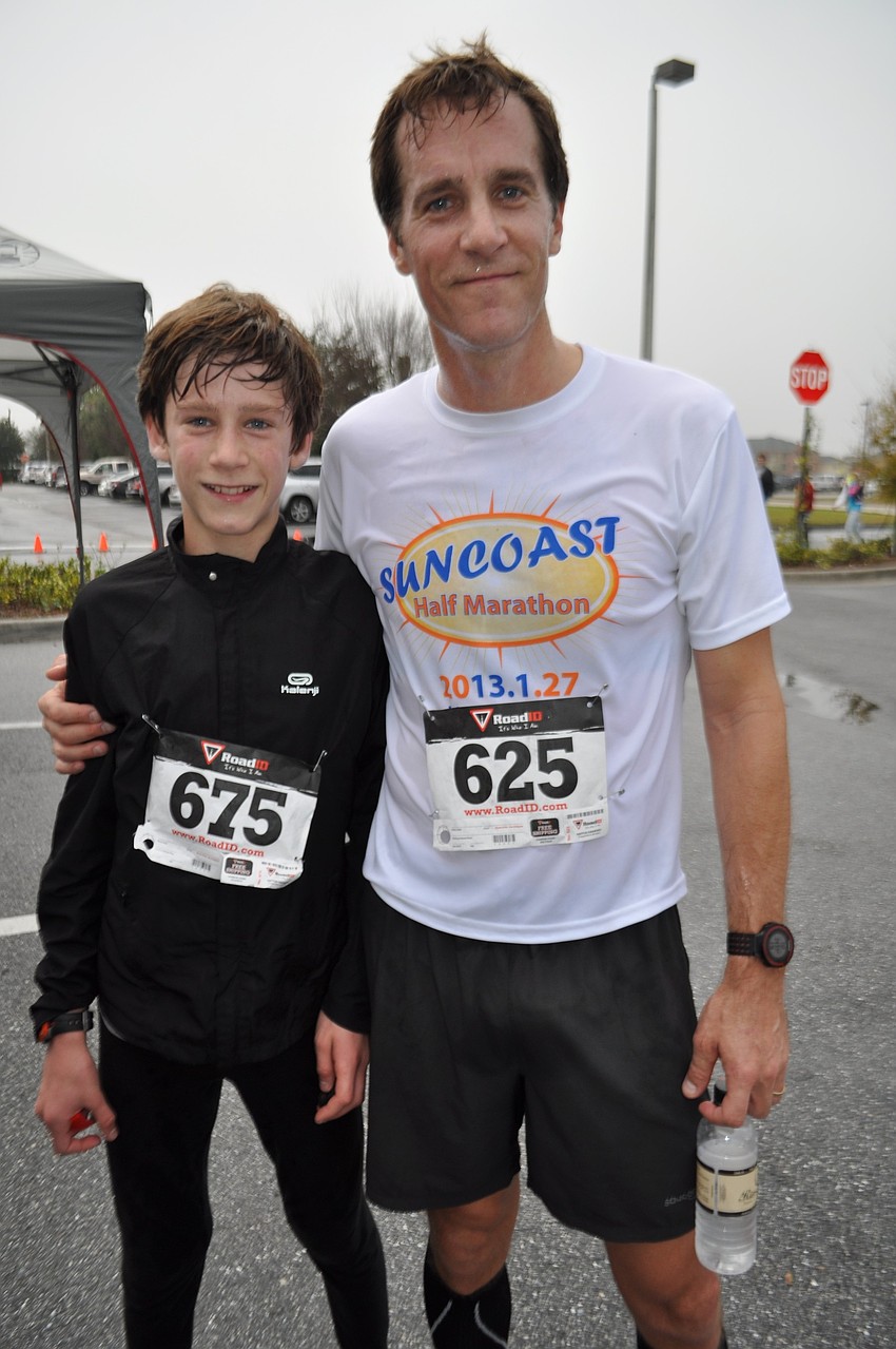 Charlie and Tim Richardson check out vendor booths after the race.