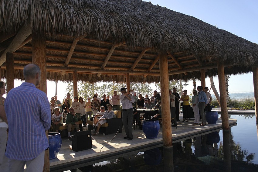 Architect Guy Peterson speaks to attendees about what inspired the architecture and points out unique design features.