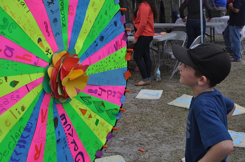 First grader Brady Wilson spun the wheel.