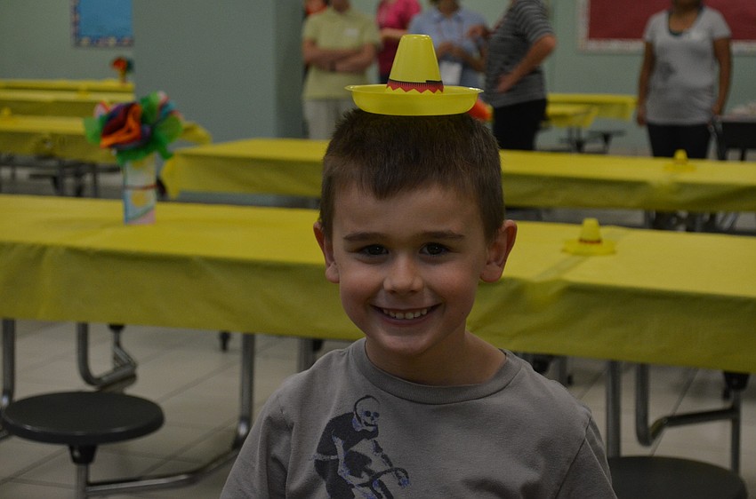 Brady Wener wears a mini-sombrero.