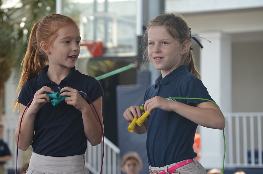 Kendell D. and Evelina G. get ready to jump rope.