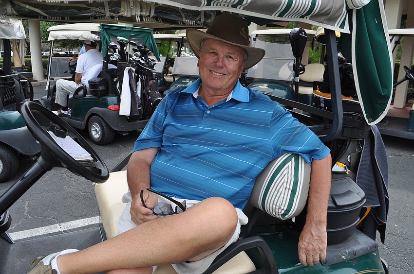 John DeVoldre waits for his golfing partner.
