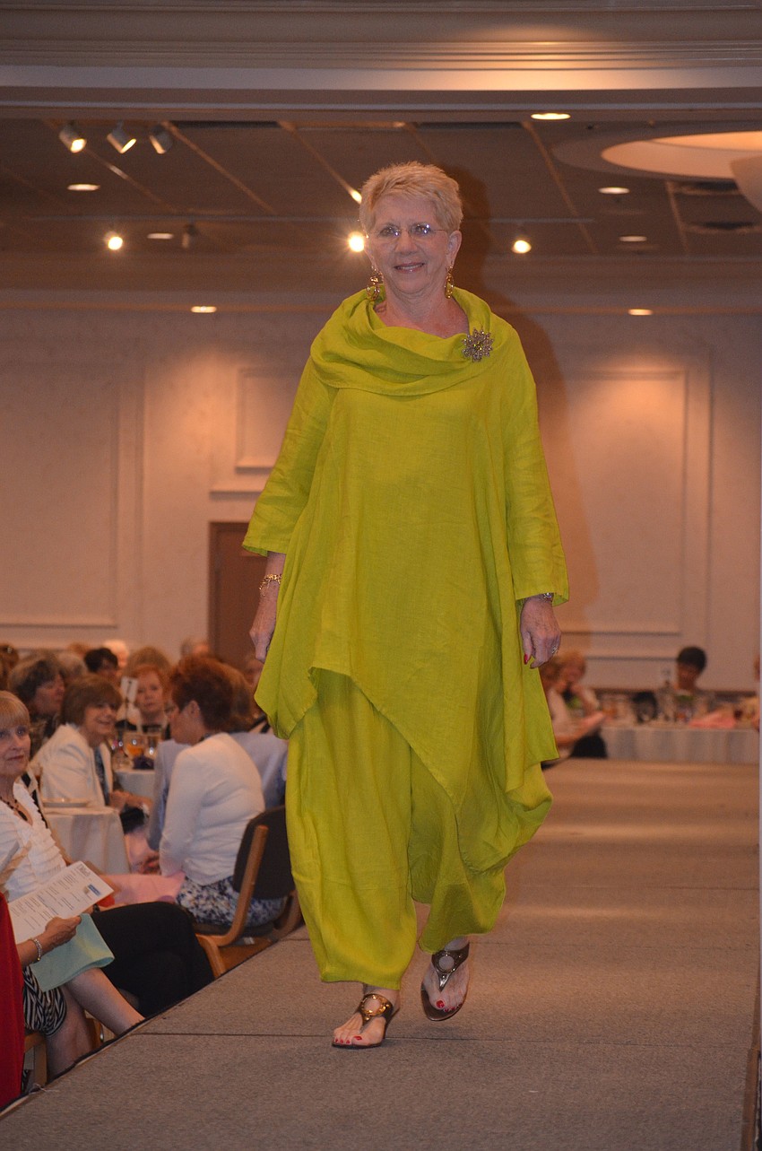 Marlene Wagner wears a two-piece outfit.