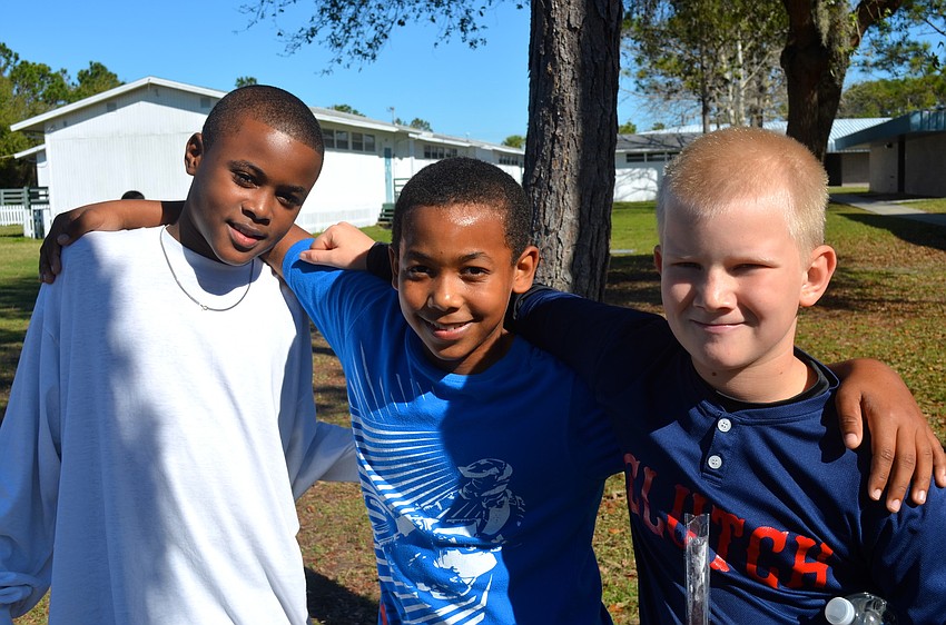 Eleven-year-olds Clinton Matthews, Ezra Mason and Mason Bradley play it cool.