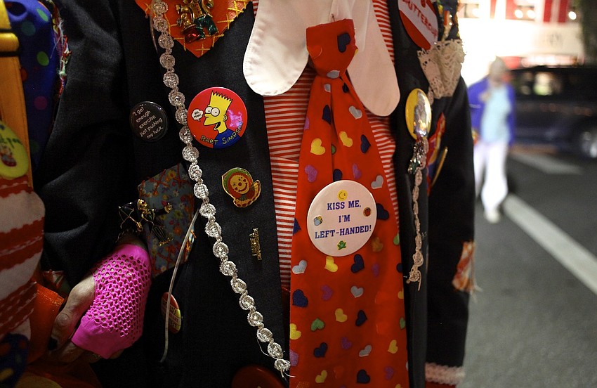 Mardi Gras brings out the color and character of the residents around the Circle, like the buttons found on Mike â€œButtercupâ€ Turkeâ€™s suit coat.