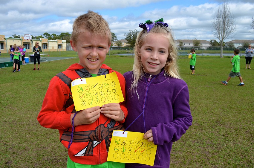 Cooper Perrine, 8, and Madison Pandelo, 7 are all smiles.